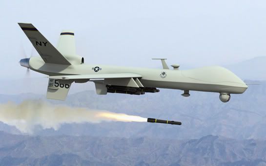 predator drone photo: Drone 051112-predator-firing-missile.jpg